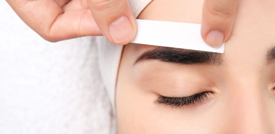 Young,Woman,Having,Professional,Eyebrow,Correction,Procedure,,Closeup